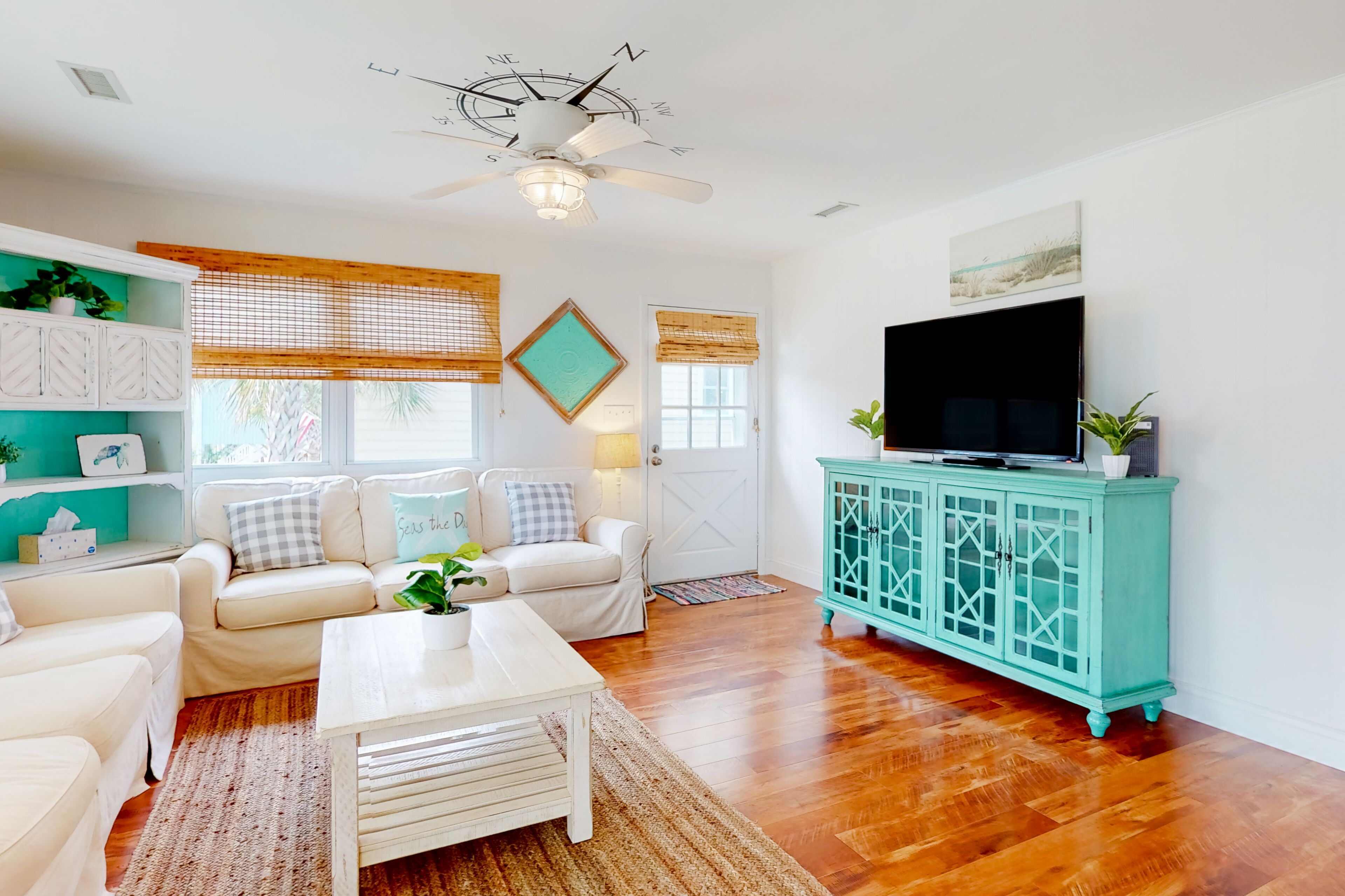 Canal-front home on Holden Beach with dock, deck & beach gear - dog-friendly