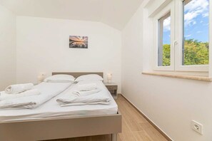 2 chambres, accès au Wi-Fi (inclus), literie fournie