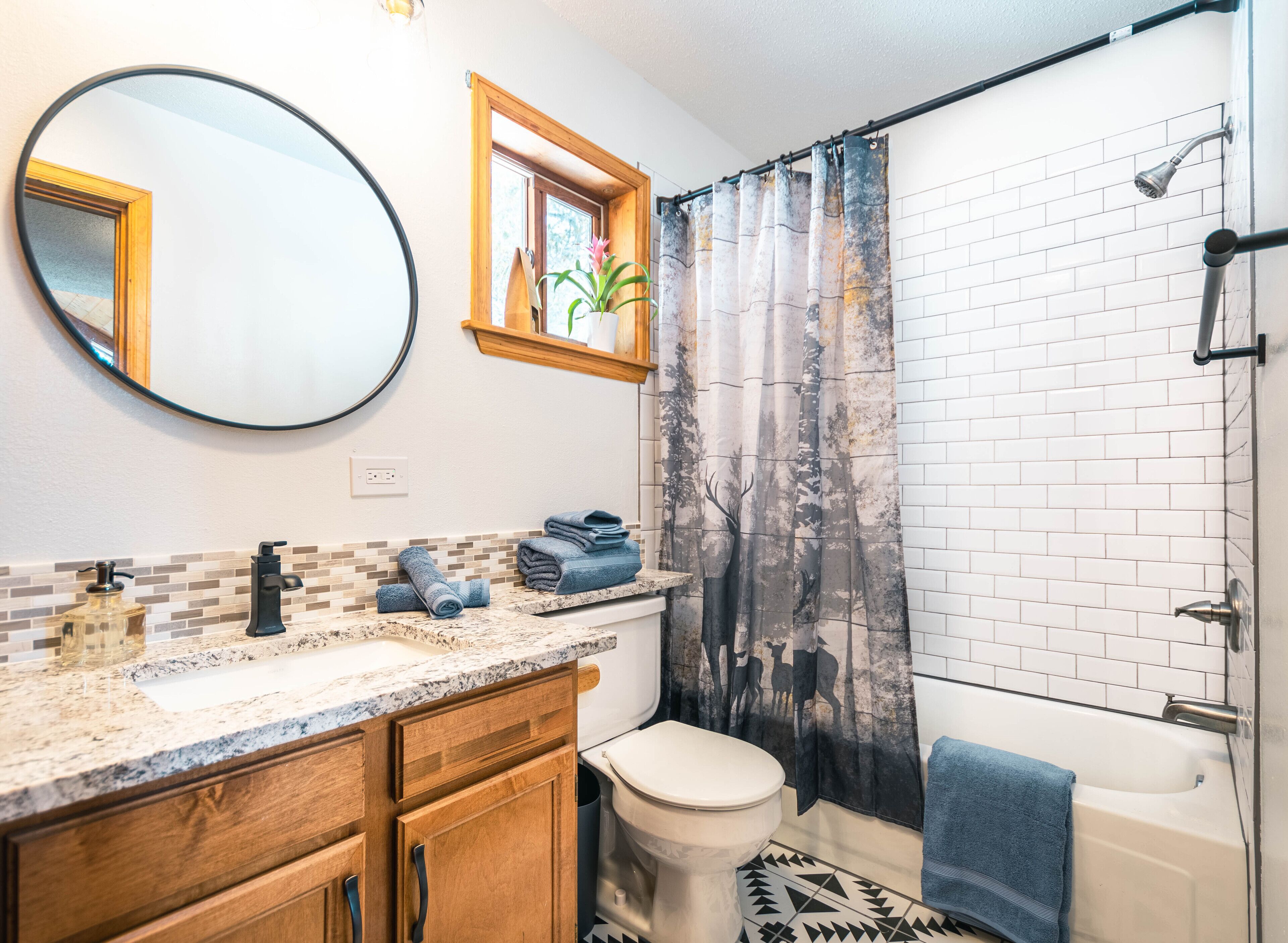Bathtub, hair dryer, towels, soap