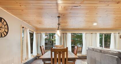 Renovated lake-view retreat with full rec lake access, boat slips, & firepits