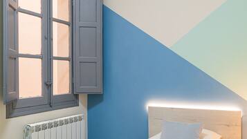 2 slaapkamers, een strijkplank/strijkijzer, reisbedje, gratis wifi