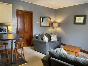 Apartment | Living room | 30-inch TV with digital channels - Milecastle Inn on Hadrian's Wall Near Haltwhistle (Haltwhistle)