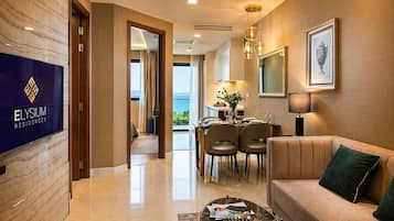 Executive Deluxe 1 Bedroom Suite, Seaview | Living area | Smart TV