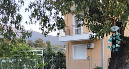 country house among trees and garden