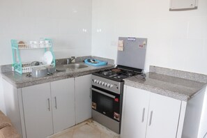 Elite Apartment | Private kitchen | Fridge, microwave, cookware/dishes/utensils - Stay.Plus Kijani Apartments (Malindi)