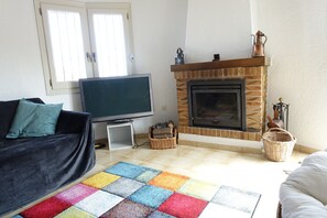 Televisie en een open haard