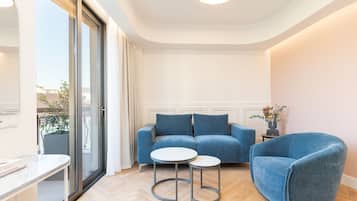 Urban Suite City View | Living area | 43-inch Smart TV with digital channels, TV, tablet