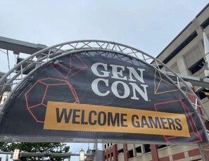 A large arch sign with "GEN CON" and "WELCOME GAMERS" text, indicating a gaming event. - Your home when in Indy. 10 minutes to downtown (Indianapolis)