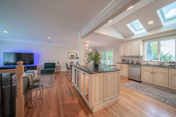 TV, fireplace, books, offices