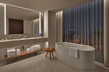 Rainfall showerhead, designer toiletries, hair dryer, bathrobes at The Tampa EDITION