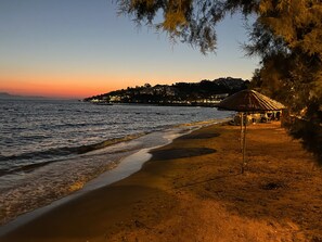 On the beach, sun loungers, beach towels