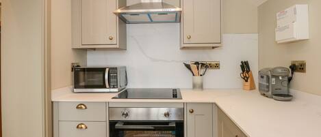 Fridge, electric kettle, toaster, cookware/dishes/utensils