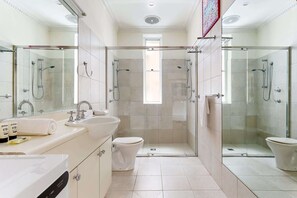 Shower, hair dryer, towels, shampoo