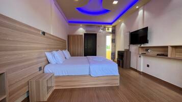 Premium bedding, pillowtop beds, free minibar items, in-room safe
