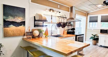 Boho, plant-filled home w/ wood + leather touches, 3 beds, 2 baths, super clean.