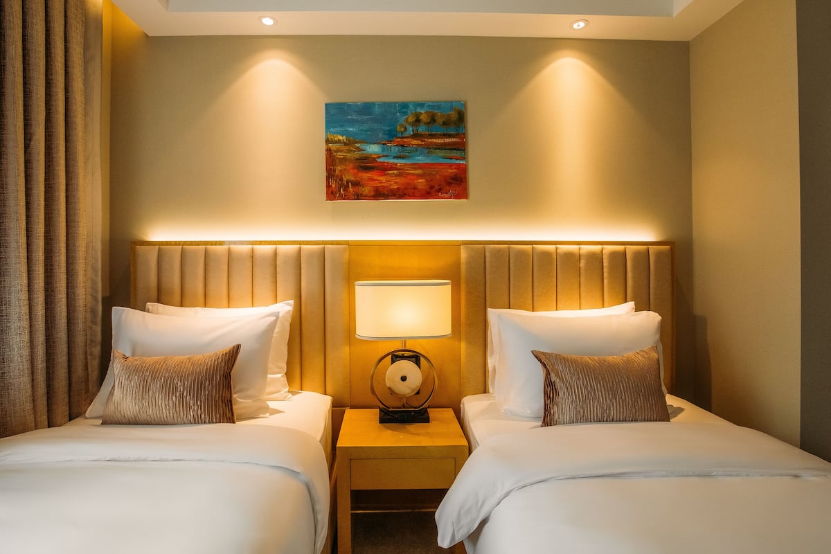 Chambre Standard avec lits jumeaux | Minibar, coffre-fort, système d’insonorisation