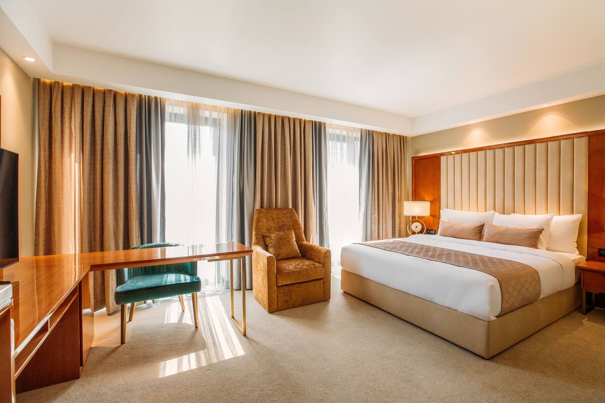 Chambre Junior | Minibar, coffre-fort, système d’insonorisation