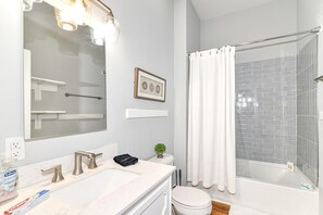 Combined shower/tub