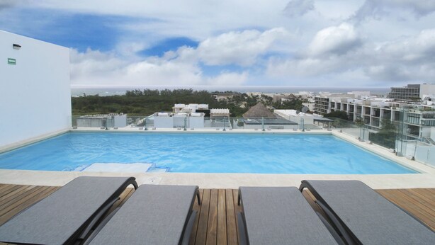 Rooftop pool - DK Exclusive 1 bedroom Apartment (Playa del Carmen)