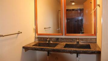 Combined shower/tub, toilet paper