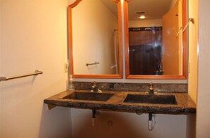 Combined shower/tub, toilet paper