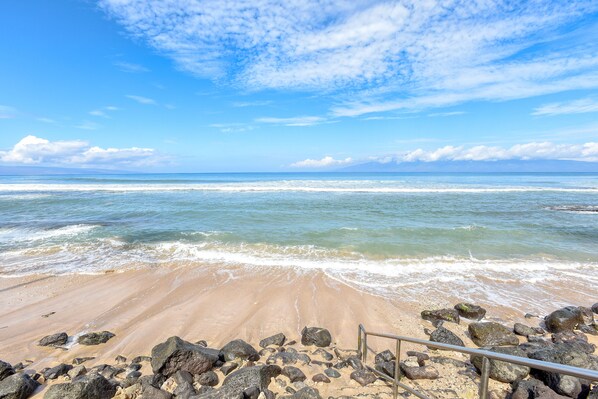 On the beach, sun-loungers, beach towels