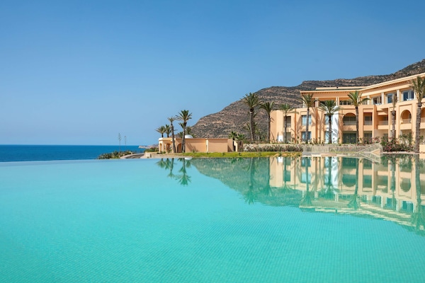 2 indoor pools, outdoor pool, open 8:00 AM to 7:00 PM, pool umbrellas