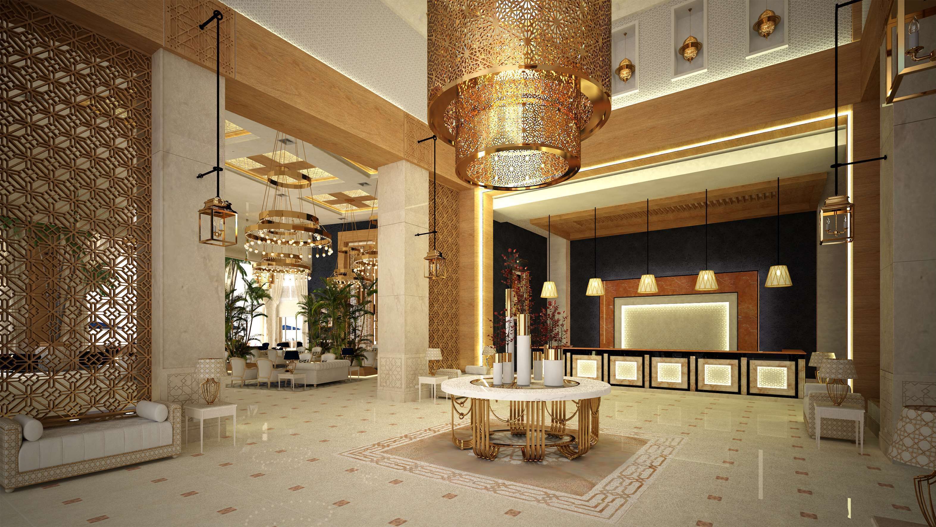 A luxurious lobby with ornate chandeliers, a central round table, and a reception area.