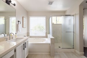 Combined shower/bathtub, hair dryer, towels, soap - Family Retreat: 5BR, Heated Pool, Games & Hot Tub (Chandler)