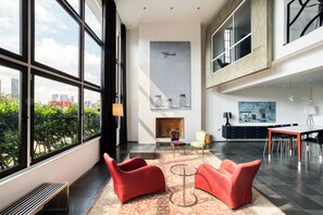 Apartamento Deluxe | Zona de estar