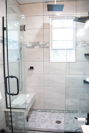 Shower, hair dryer, towels, toilet paper