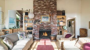 55-inch TV with digital channels, fireplace