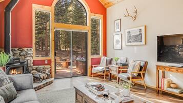 55-inch TV with digital channels, fireplace, table football