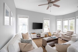 55-inch TV with digital channels, table football, streaming services