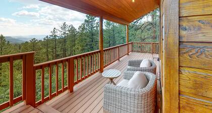 Enchanting mountainside home with fireplace, skiing, lake view, & washer/dryer