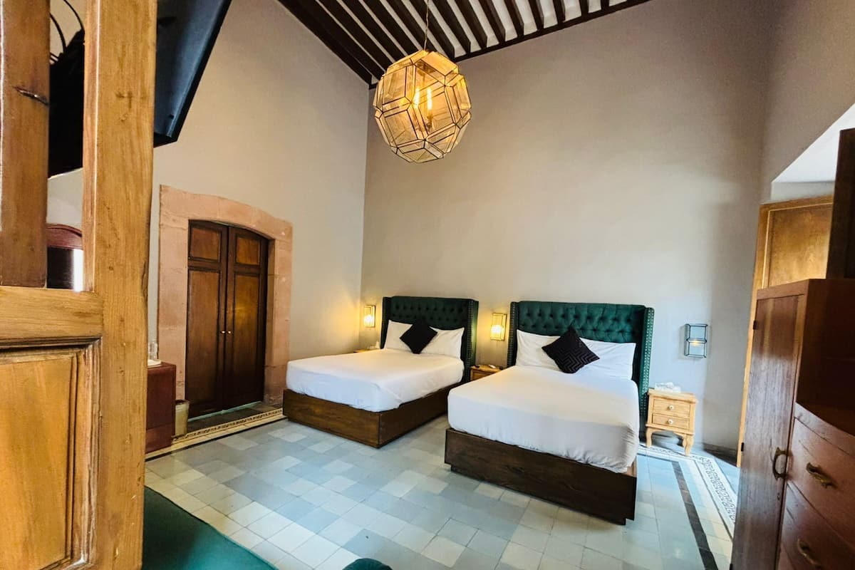 Premium bedding, down duvets, iron/ironing board (on request), free WiFi