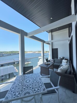 Outdoor dining - Topsider Penthouse 502 + 3 King Suite + 48x14 Slip at 19MM
 (Osage Beach)