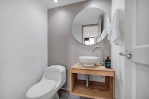 Bathtub, hair dryer, towels, soap