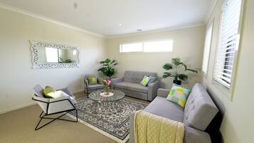 Comfort House | Living area | 60-inch LED TV with satellite channels, TV