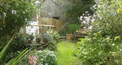 Tranquil wood cabin set in a beautiful orchard
