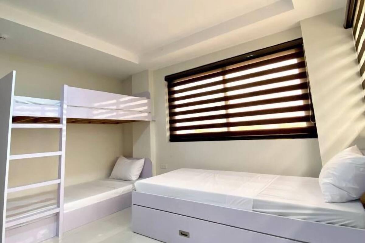 1 bedroom, premium bedding, down comforters, individually decorated