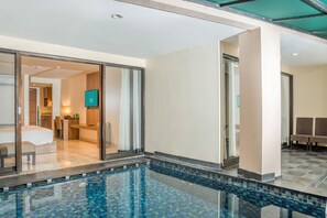 Suite Deluxe | Minibar, una scrivania, postazione laptop, Wi-Fi gratuito