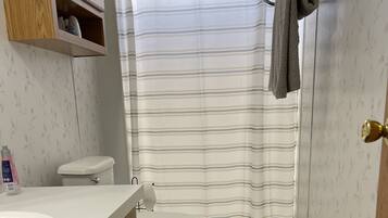 Shower, towels, soap, shampoo