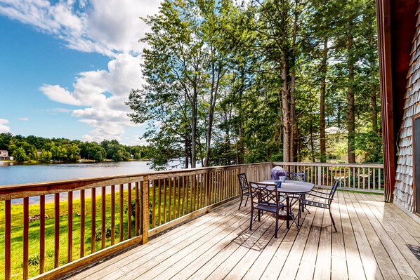 Outdoor dining - Waterfront home with wraparound deck, floating fireplace, deck, & firepit (Center Barnstead)