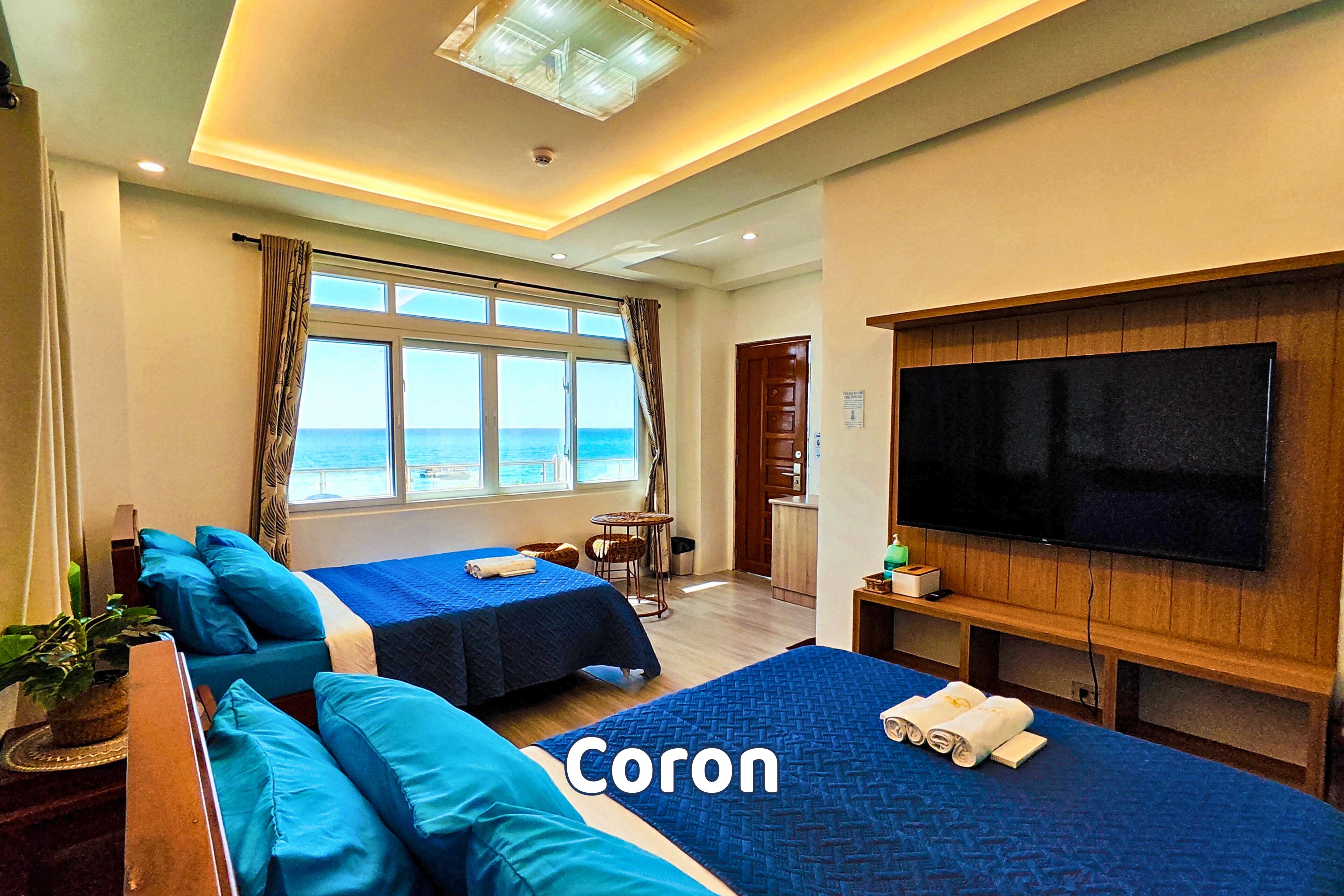 Habitación cuádruple Deluxe, 2 camas matrimoniales, aire acondicionado, vista al mar | Decoración personalizada, insonorización, wifi gratis y ropa de cama 