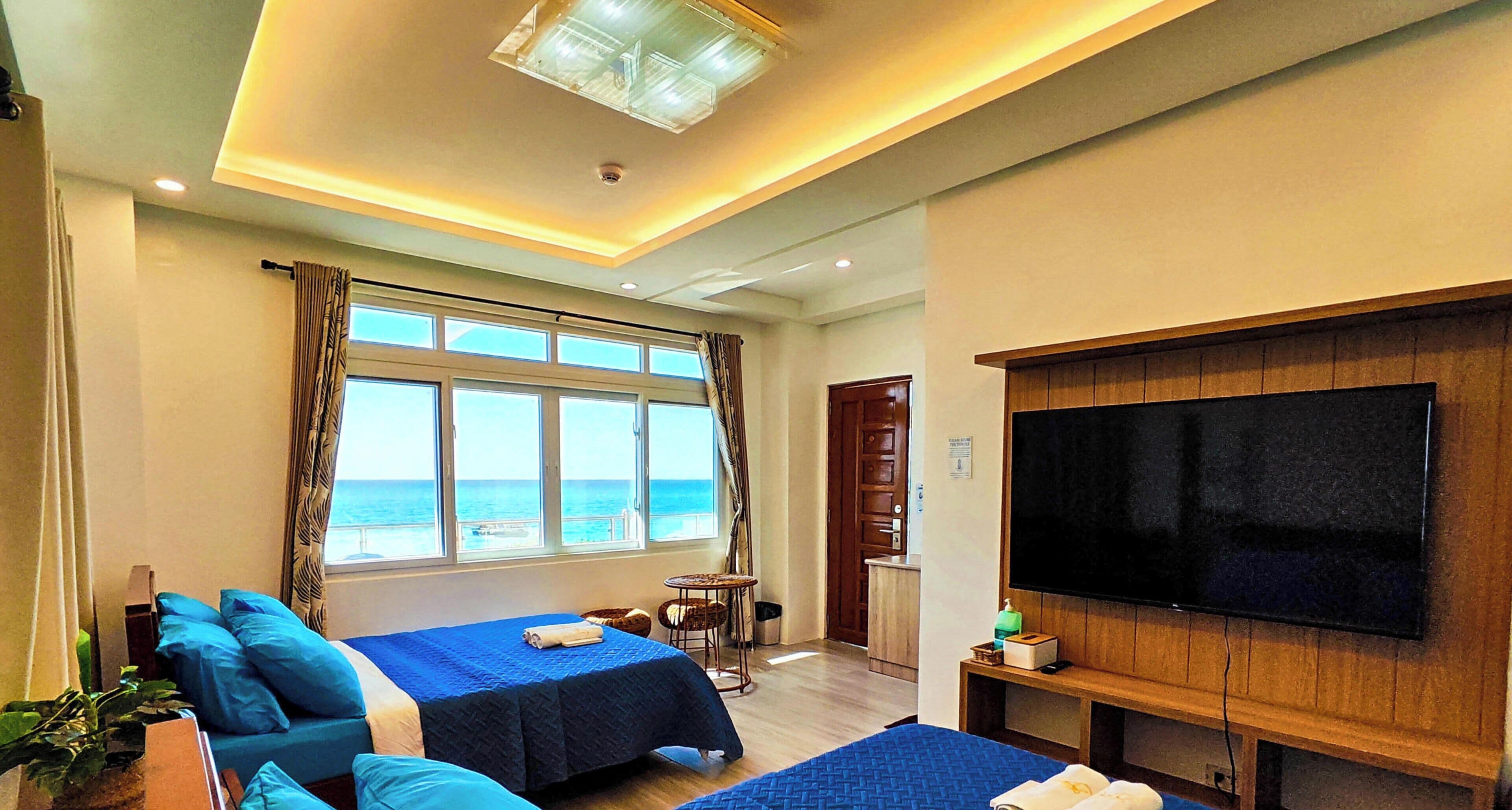 Chambre quadruple Deluxe, 2 lits doubles, climatisation, vue sur la mer | Décor unique, système d’insonorisation, accès au Wi-Fi (inclus)