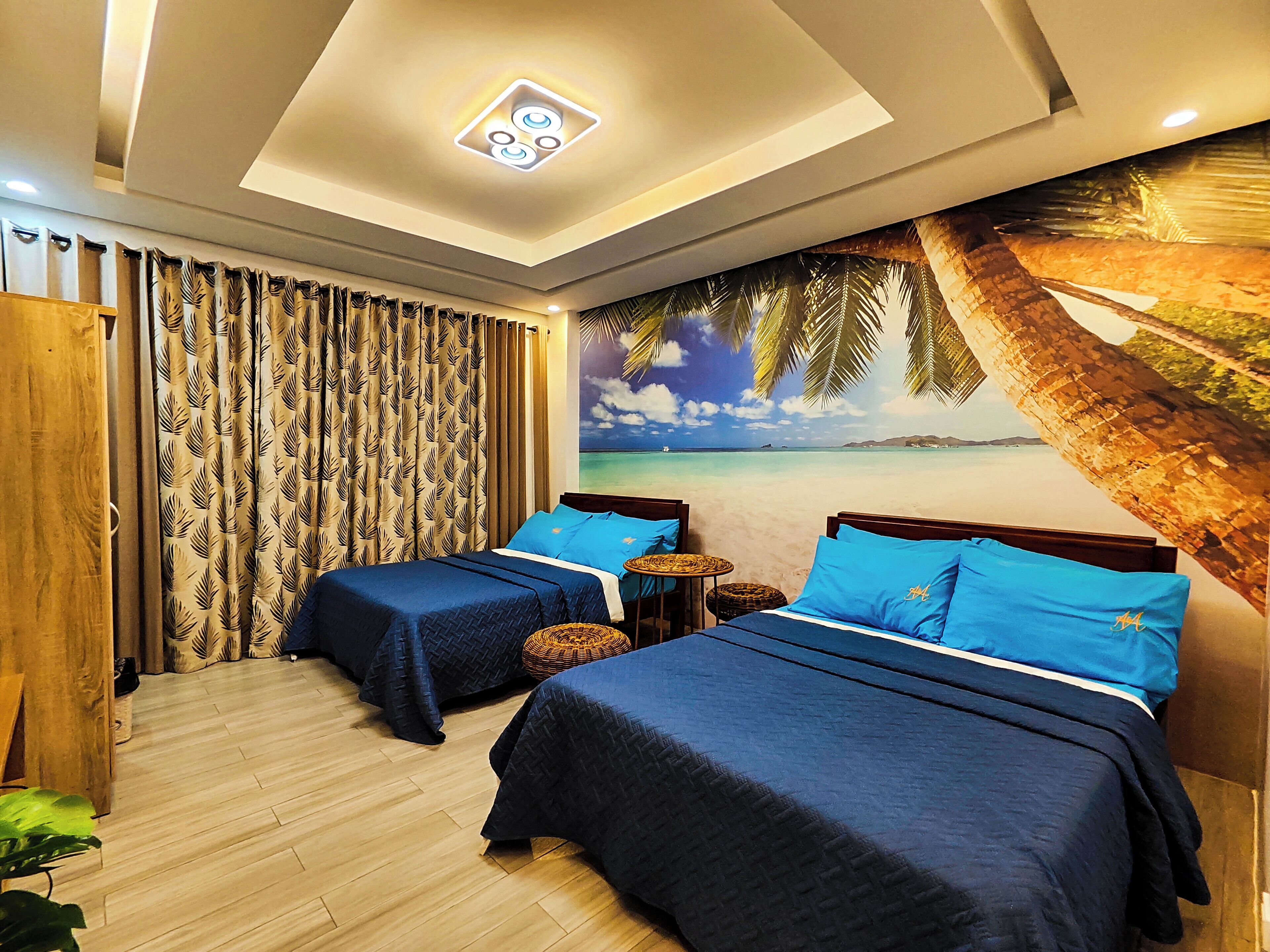 Habitación cuádruple Deluxe, 2 camas matrimoniales, para no fumadores, aire acondicionado | Decoración personalizada, insonorización, wifi gratis y ropa de cama 