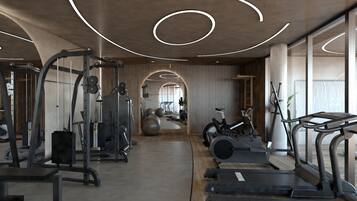 Un gimnasio moderno con diversos equipos de ejercicio, incluyendo cintas de correr y máquinas de pesas, y un diseño amplio con iluminación natural.