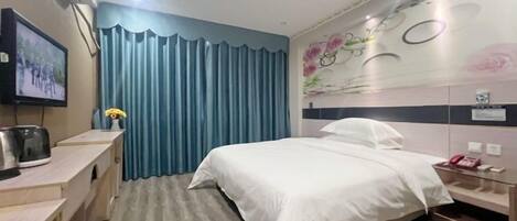 A hotel room with a bed, a desk, a TV, and a curtain.