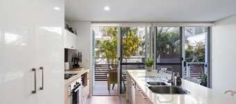 Riverside luxury apartment across two levels at Waterline.